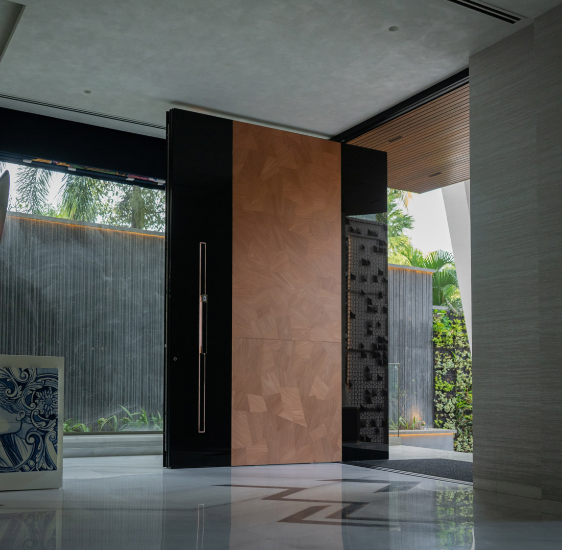 Premium aluminium entrance door in anthracite with brass handle